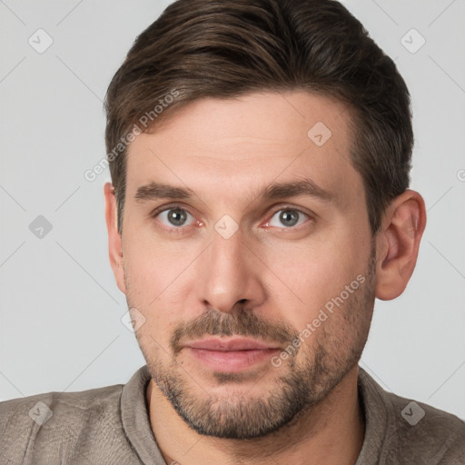 Neutral white young-adult male with short  brown hair and brown eyes