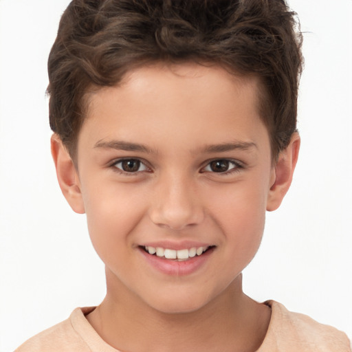 Joyful white child male with short  brown hair and brown eyes