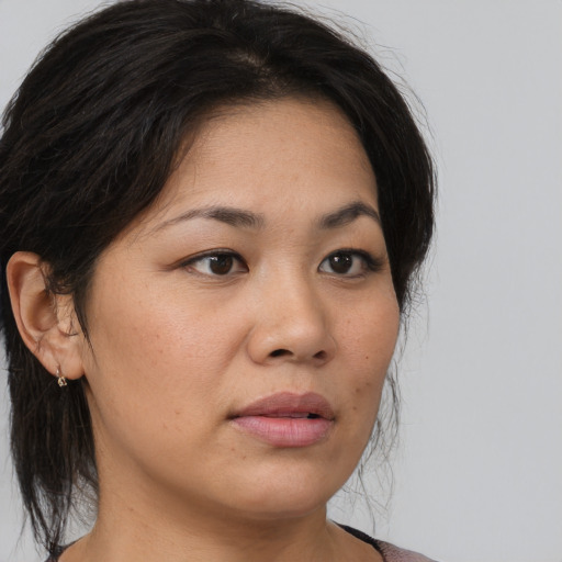 Neutral asian young-adult female with medium  brown hair and brown eyes