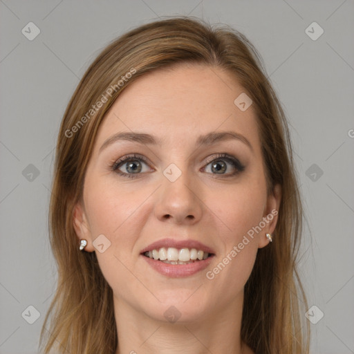 Joyful white young-adult female with long  brown hair and grey eyes