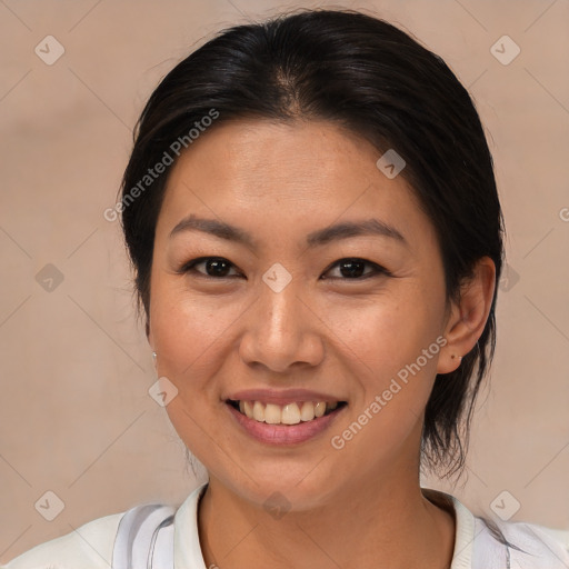 Joyful asian young-adult female with medium  brown hair and brown eyes