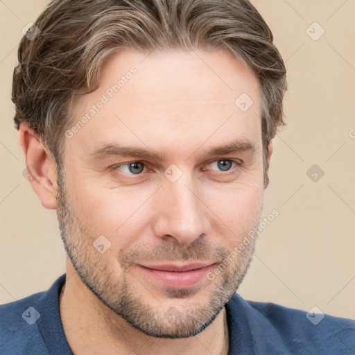 Joyful white adult male with short  brown hair and grey eyes