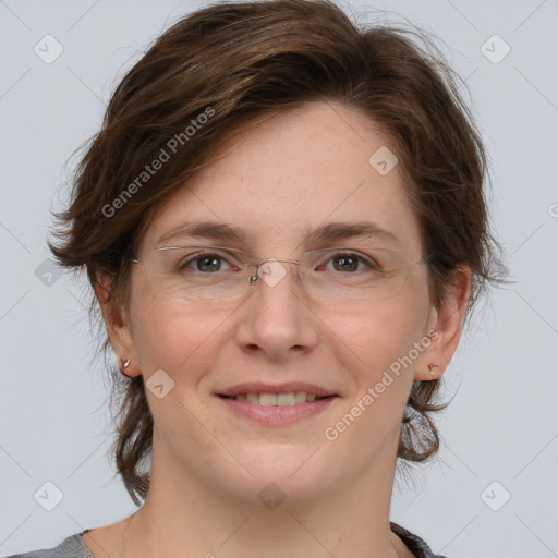 Joyful white adult female with medium  brown hair and grey eyes