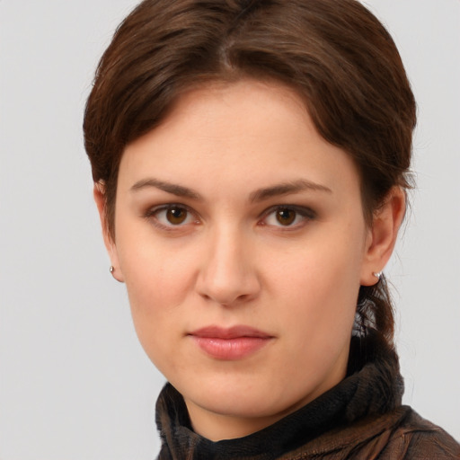 Neutral white young-adult female with short  brown hair and brown eyes