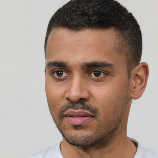 Neutral black young-adult male with short  black hair and brown eyes