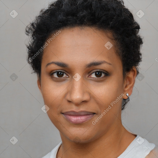 Joyful black young-adult female with short  brown hair and brown eyes