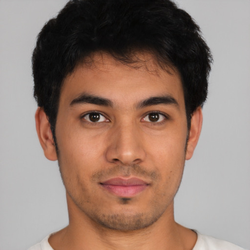 Neutral latino young-adult male with short  black hair and brown eyes