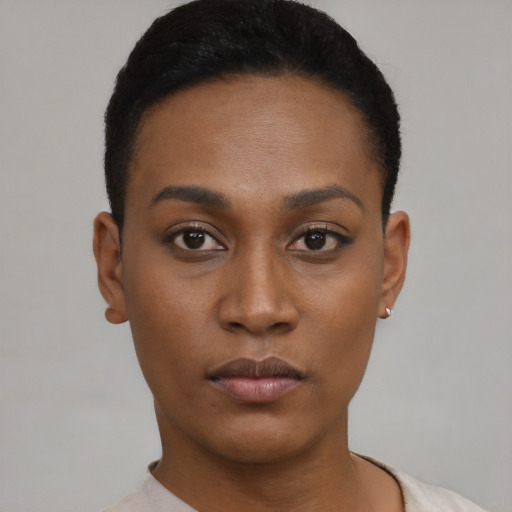 Neutral black young-adult female with short  black hair and brown eyes