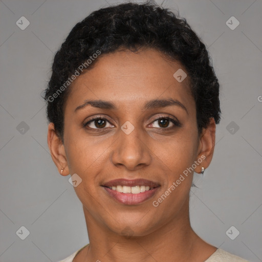 Joyful latino young-adult female with short  black hair and brown eyes