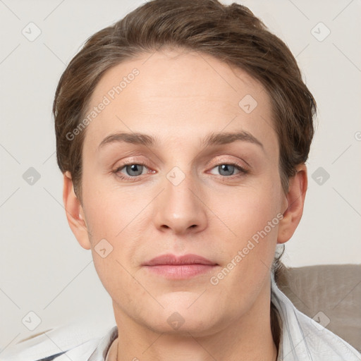 Joyful white young-adult female with short  brown hair and grey eyes