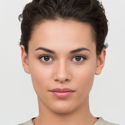 Neutral white young-adult female with short  brown hair and brown eyes