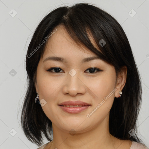 Joyful asian young-adult female with medium  brown hair and brown eyes