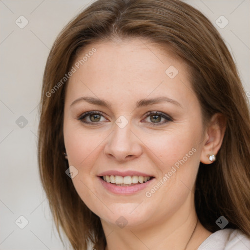 Joyful white young-adult female with medium  brown hair and green eyes