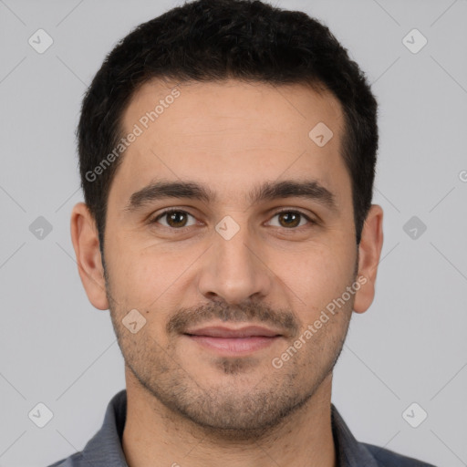 Joyful white young-adult male with short  brown hair and brown eyes