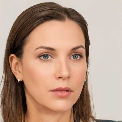 Neutral white young-adult female with long  brown hair and grey eyes