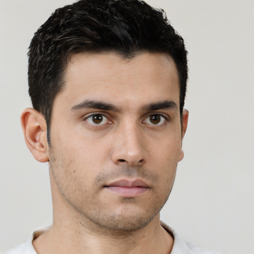 Neutral white young-adult male with short  black hair and brown eyes