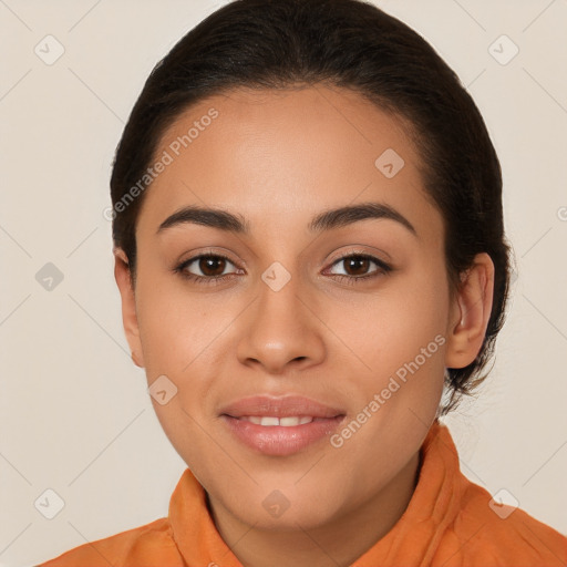 Joyful latino young-adult female with long  brown hair and brown eyes