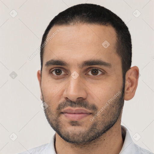 Neutral white young-adult male with short  black hair and brown eyes