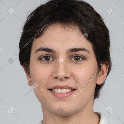 Joyful white young-adult female with short  brown hair and brown eyes