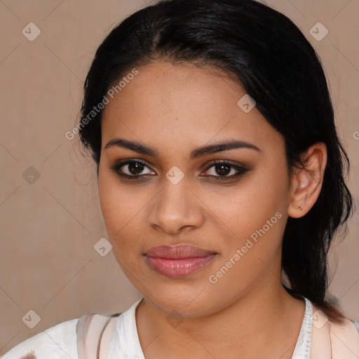 Joyful latino young-adult female with medium  black hair and brown eyes