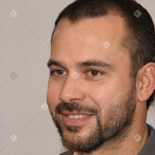 Joyful white adult male with short  brown hair and brown eyes