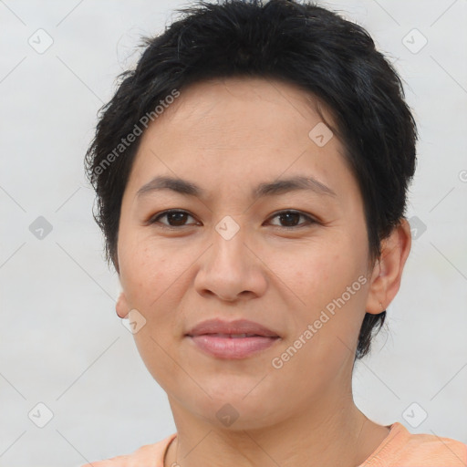 Joyful asian young-adult female with short  brown hair and brown eyes