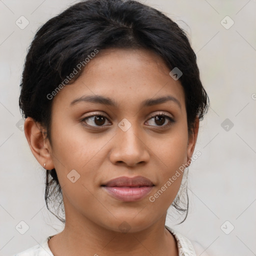 Joyful latino young-adult female with medium  brown hair and brown eyes