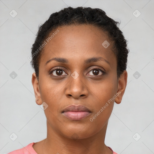 Neutral black young-adult female with short  brown hair and brown eyes