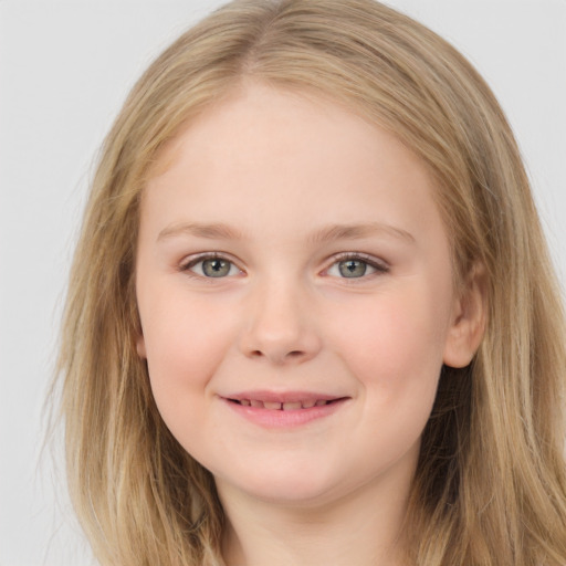 Joyful white child female with long  brown hair and brown eyes