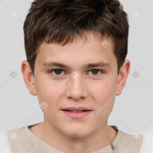 Joyful white child male with short  brown hair and brown eyes