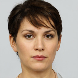 Neutral white young-adult female with short  brown hair and brown eyes