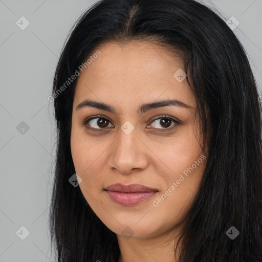 Joyful latino young-adult female with long  brown hair and brown eyes