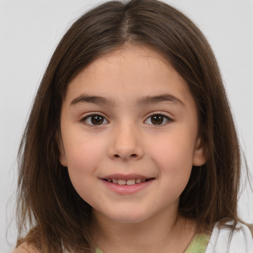 Joyful white child female with medium  brown hair and brown eyes