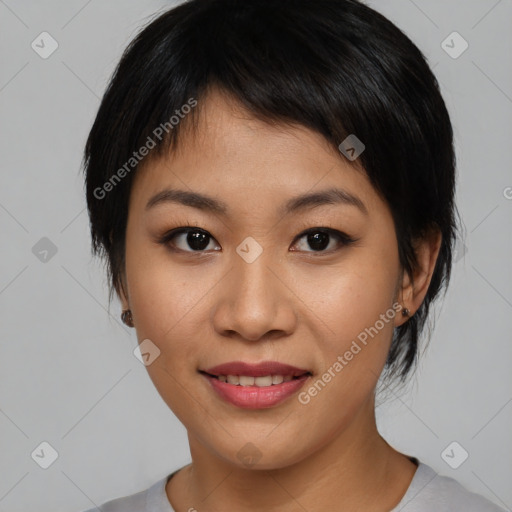 Joyful asian young-adult female with medium  black hair and brown eyes