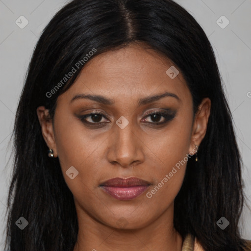 Joyful black young-adult female with long  brown hair and brown eyes