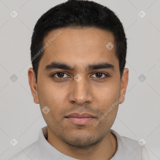 Neutral latino young-adult male with short  black hair and brown eyes