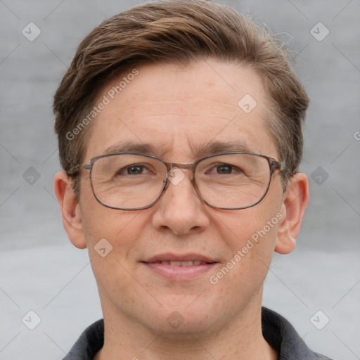 Joyful white adult male with short  brown hair and grey eyes