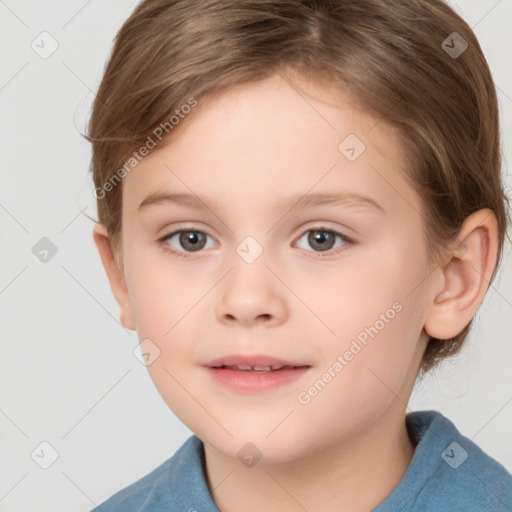 Joyful white child female with short  brown hair and brown eyes