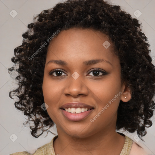 Joyful black young-adult female with medium  black hair and brown eyes