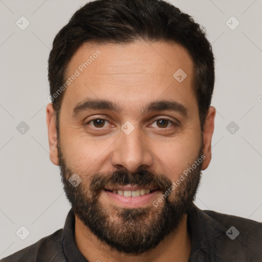 Joyful white adult male with short  brown hair and brown eyes