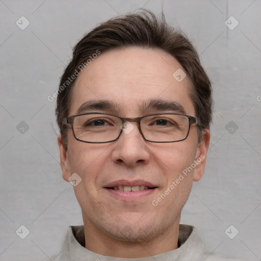 Joyful white adult male with short  brown hair and grey eyes