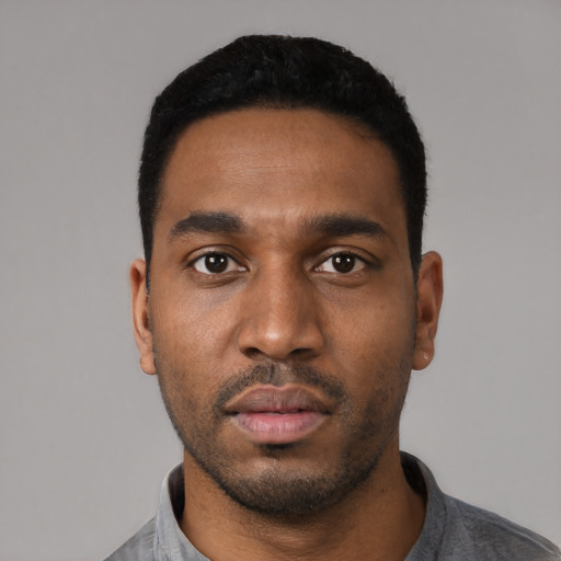 Neutral black young-adult male with short  black hair and brown eyes