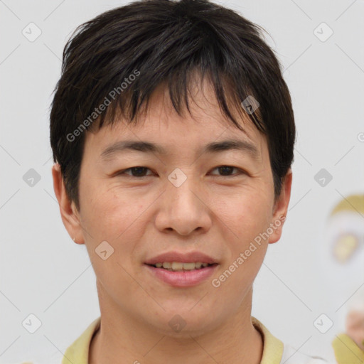 Joyful asian young-adult female with short  brown hair and brown eyes