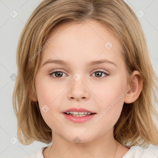 Joyful white child female with medium  brown hair and brown eyes