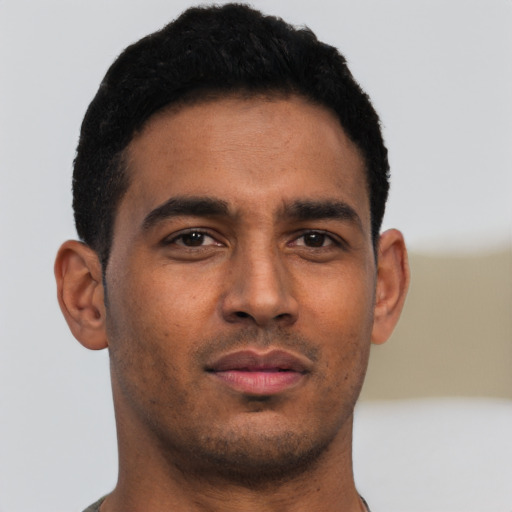 Neutral latino young-adult male with short  brown hair and brown eyes
