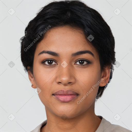 Joyful latino young-adult female with short  black hair and brown eyes