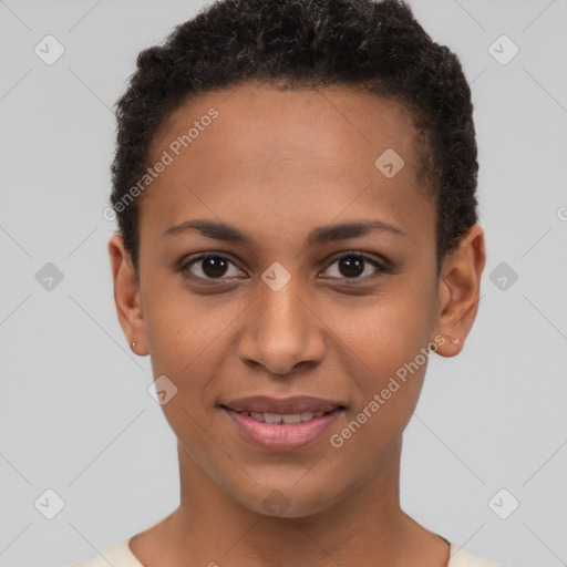 Joyful black young-adult female with short  brown hair and brown eyes