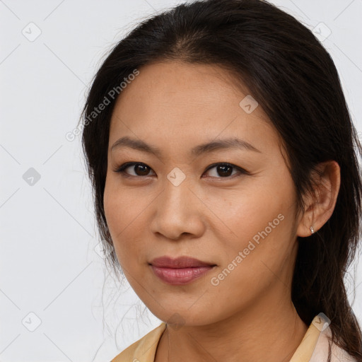 Joyful asian young-adult female with long  brown hair and brown eyes