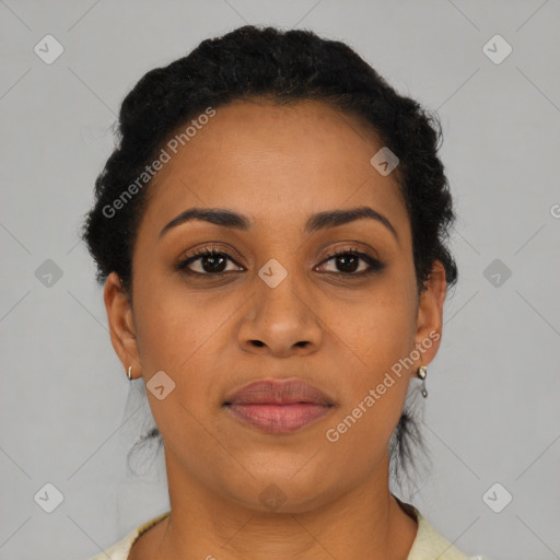Joyful latino young-adult female with short  brown hair and brown eyes