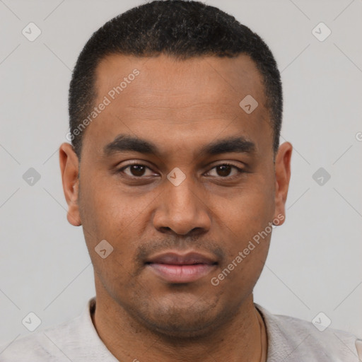 Neutral latino young-adult male with short  black hair and brown eyes